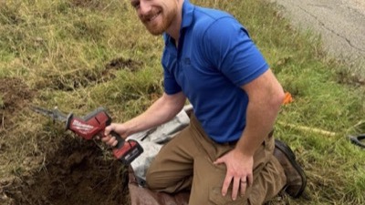 Warren Brothers plumber performing outdoor pipe repair in Central Texas - licensed plumbing services in Austin, Bastrop, and Elgin