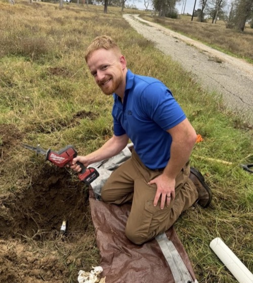 Warren Brothers plumber performing outdoor pipe repair in Central Texas - licensed plumbing services in Austin, Bastrop, and Elgin